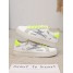 Basket Yona Yellow blanche avec éclair argenté pailleté et détails jaune fluo de la marque Findlay